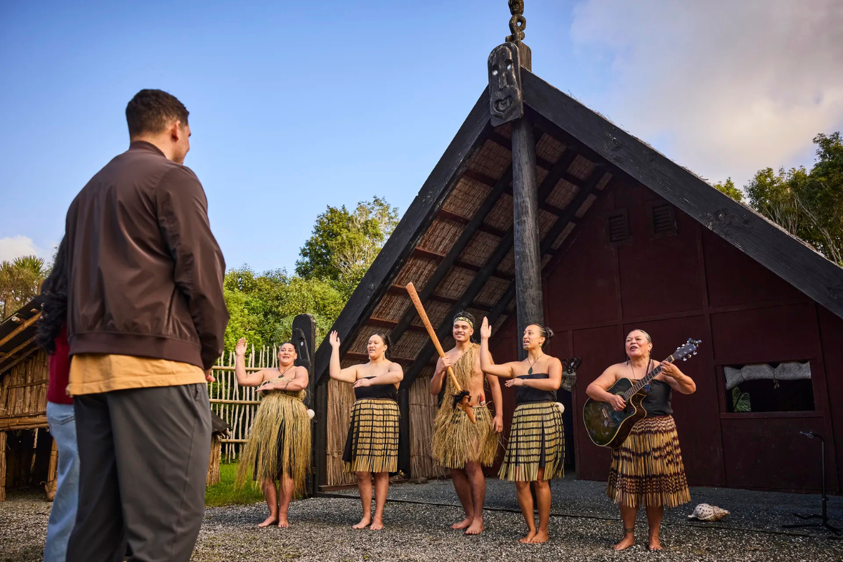 People are welcomed onto a marae